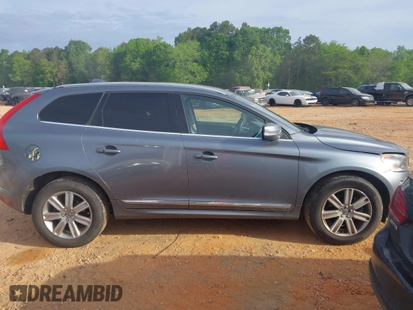 2017 Volvo XC60 Inscription z VIN YV440MDU1H2199868, wystawiony jako IAAI lot #42104412 z przebiegiem 169 841 mil mil oraz . Historia ofert i sprzedaży dostępna na DreamBid. Obrazek 13.