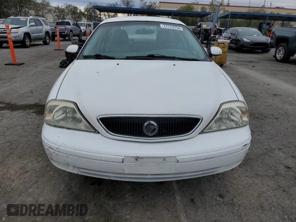 2001 Mercury Sable with VIN 1MEFM53U31A629921, listed as a Copart auction lot 77173754 with 122,769 mi miles and Salvage title. Bid and sale history available at DreamBid. Image 5.