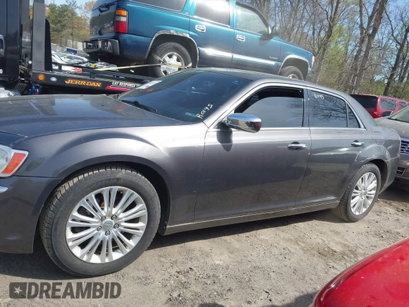 2013 Chrysler 300 C with VIN 2C3CCAKT2DH567348, listed as a IAAI auction lot 41909284 with 110,710 mi miles and . Bid and sale history available at DreamBid. Image 14.