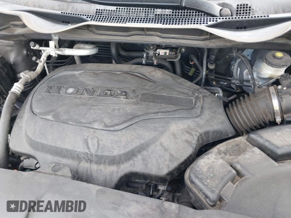 2022 Honda Odyssey Touring with VIN 5FNRL6H80NB023623, listed as a IAAI auction lot 41512586 with 63,329 mi miles and . Bid and sale history available at DreamBid. Image 10.