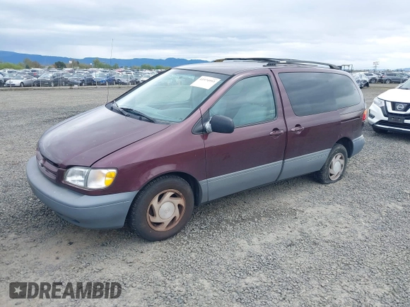 1999 Toyota Sienna LE with VIN 4T3ZF13C7XU152879, listed as a IAAI auction lot 41974953 with 201,644 mi miles. Bid and sale history available at carsss.com. Image 2.