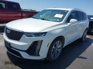 2021 Cadillac XT6 Premium Luxury with VIN 1GYKPCRS2MZ151718, listed as a IAAI auction lot 41978392 with 58,230 mi miles and . Bid and sale history available at DreamBid. Image 2.