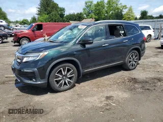 2020 Honda Pilot Touring 8-Passenger with VIN 5FNYF6H99LB053227, listed as a Copart auction lot 61302225 with 118,156 mi miles and Salvage title. Bid and sale history available at DreamBid. Image 1.
