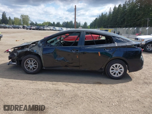 2021 Toyota Prius L Eco with VIN JTDKAMFU3M3140233, listed as a IAAI auction lot 42182685 with 38,842 mi miles and . Bid and sale history available at DreamBid. Image 15.