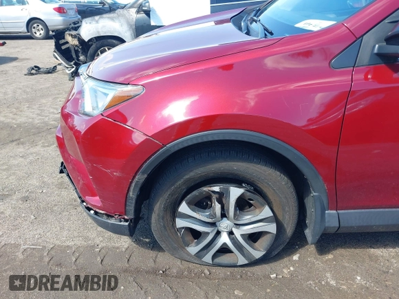 2018 Toyota RAV4 LE with VIN JTMBFREV2JD228186, listed as a IAAI auction lot 42076730 with 93,899 mi miles. Bid and sale history available at carsss.com. Image 18.