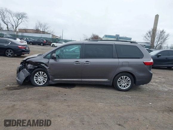 2016 Toyota Sienna XLE with VIN 5TDYK3DCXGS737846, listed as a IAAI auction lot 41782055 with 126,846 mi miles. Bid and sale history available at carsss.com. Image 14.