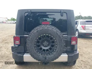 2008 Jeep Wrangler Unlimited Sahara with VIN 1J4GA59128L504798, listed as a IAAI auction lot 42210839 with 162,406 mi miles and . Bid and sale history available at DreamBid. Image 17.