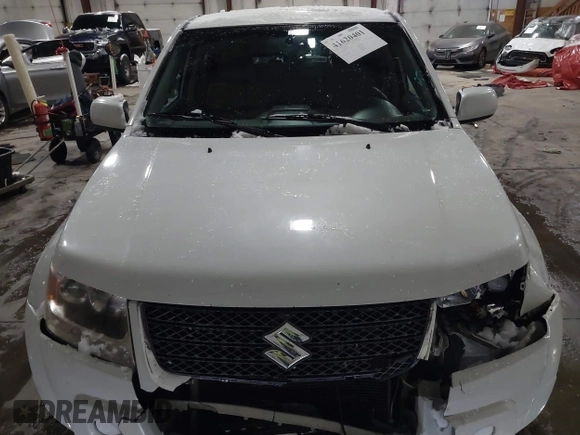 2011 Suzuki Grand Vitara Premium z VIN JS3TD0D24B4101861, wystawiony jako IAAI lot #41620401 z przebiegiem 151 034 mil mil oraz . Historia ofert i sprzedaży dostępna na DreamBid. Obrazek 12.