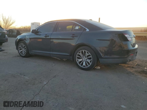 2015 Ford Taurus Limited with VIN 1FAHP2F88FG144487, listed as a Copart auction lot 42692205 with 147,597 mi miles and Salvage Title. Bid and sale history available at DreamBid. Image 2.