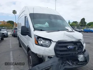 2020 Ford Transit Cargo with VIN 1FTBW3XG2LKB18281, listed as a IAAI auction lot 42022187 with 84,323 mi miles. Bid and sale history available at carsss.com. Image 1.