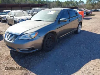 2013 Chrysler 200 LX with VIN 1C3CCBAB4DN640550, listed as a IAAI auction lot 41339796 with 136,235 mi miles. Bid and sale history available at carsss.com. Image 2.