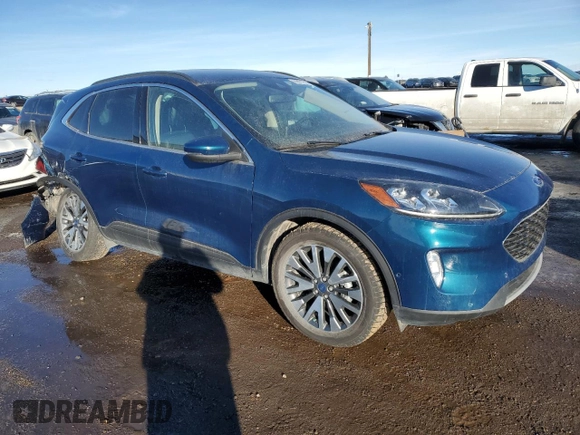 2020 Ford Escape Titanium Hybrid with VIN 1FMCU9DZXLUB46252, listed as a Copart auction lot 88801835 with 64,443 mi miles and Salvage title. Bid and sale history available at DreamBid. Image 4.