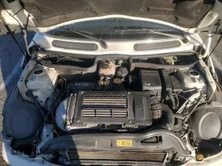 2007 MINI Convertible S with VIN WMWRH33567TL94957, listed as a Copart auction lot 42127775 with 90,401 mi miles and Salvage title. Bid and sale history available at DreamBid. Image 11.