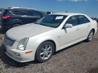 2005 Cadillac STS z VIN 1G6DW677750171537, wystawiony jako IAAI lot #42270330 z przebiegiem 126 889 mil mil oraz . Historia ofert i sprzedaży dostępna na DreamBid. Obrazek 2.