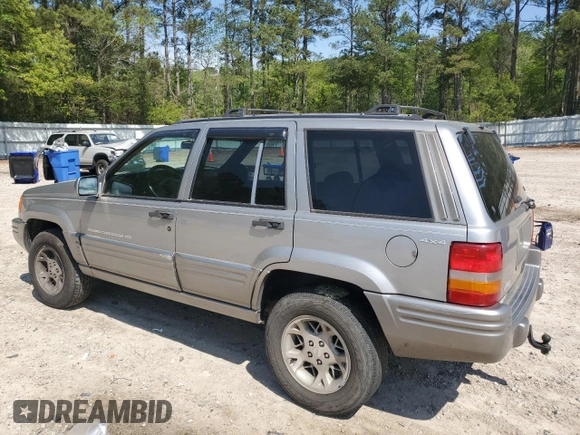 1998 Jeep Grand Cherokee Limited with VIN 1J4GZ78YXWC160346, listed as a Copart auction lot 52595655 with Not provided miles and Salvage title. Bid and sale history available at DreamBid. Image 2.