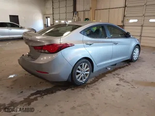 2015 Hyundai Elantra Limited with VIN 5NPDH4AE4FH621474, listed as a IAAI auction lot 40974290 with 132,533 mi miles. Bid and sale history available at carsss.com. Image 4.