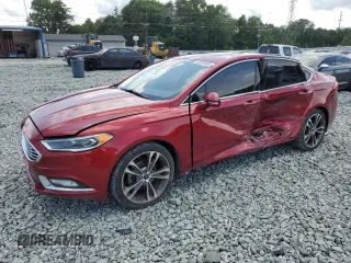 2017 Ford Fusion Titanium with VIN 3FA6P0K94HR120595, listed as a Copart auction lot 61335405 with 221,548 mi miles and Salvage title. Bid and sale history available at DreamBid. Image 1.