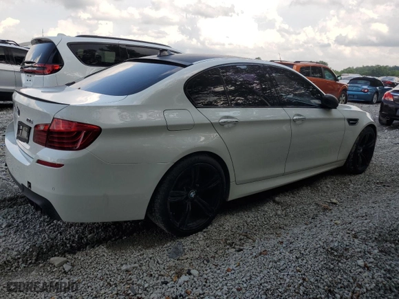 2015 BMW M5 with VIN WBSFV9C5XFD595229, listed as a Copart auction lot 63020514 with 0 mi miles and Salvage Title. Bid and sale history available at carsss.com. Image 3.