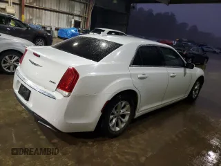 2015 Chrysler 300 Limited with VIN 2C3CCAAG5FH820184, listed as a Copart auction lot 84105134 with 210,459 mi miles and Salvage Title. Bid and sale history available at carsss.com. Image 3.