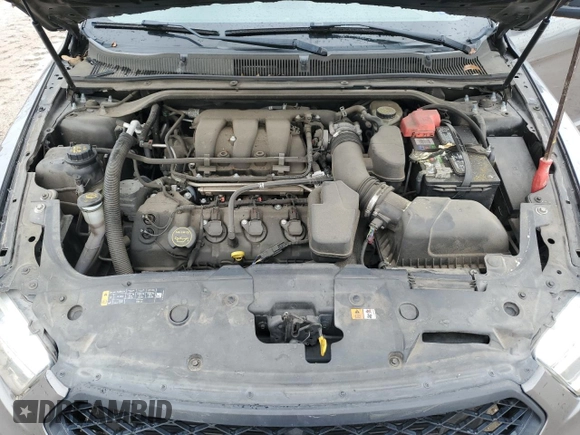 2014 Ford Taurus SE z VIN 1FAHP2D86EG143517, wystawiony jako Copart lot #51066975 z przebiegiem 134 892 mil mil oraz Szkoda całkowita • Salvage title. Historia ofert i sprzedaży dostępna na DreamBid. Obrazek 12.