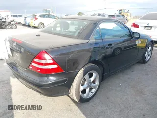 2002 Mercedes-Benz SLK 320 with VIN WDBKK65F02F241087, listed as a IAAI auction lot 41894441 with 100,232 mi miles and . Bid and sale history available at DreamBid. Image 4.