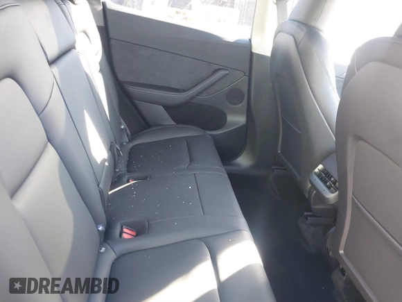 2025 Tesla Model Y Long Range with VIN 7SAYGDED0SF256230, listed as a IAAI auction lot 41356520 with 262 mi miles and . Bid and sale history available at DreamBid. Image 8.
