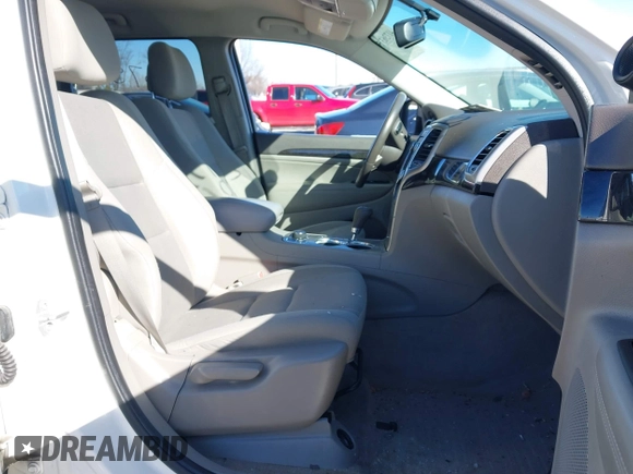 2012 Jeep Grand Cherokee Laredo with VIN 1C4RJFAGXCC224138, listed as a IAAI auction lot 41736375 with 133,383 mi miles. Bid and sale history available at carsss.com. Image 5.