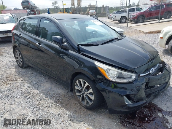 2015 Hyundai Accent Sport with VIN KMHCU5AE5FU233054, listed as a IAAI auction lot 41932298 with 70,278 mi miles. Bid and sale history available at carsss.com. Image 1.