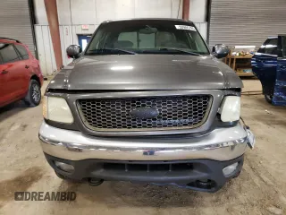 2002 Ford F-150 XLT with VIN 1FTRW08L92KD19411, listed as a Copart auction lot 50986795 with 164,556 mi miles and Clean Title. Bid and sale history available at carsss.com. Image 5.