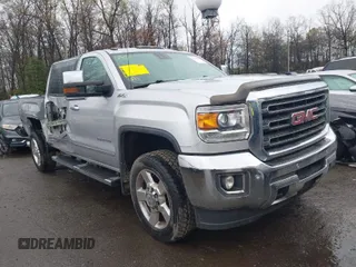 2016 GMC Sierra 2500HD SLT z VIN 1GT12TE85GF259346, wystawiony jako IAAI lot #41944247 z przebiegiem 104 368 mil mil oraz . Historia ofert i sprzedaży dostępna na DreamBid. Obrazek 1.