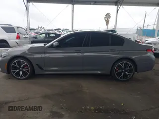 2021 BMW 5 Series 530e with VIN WBA13AG05MCF48300, listed as a IAAI auction lot 41735999 with 31,096 mi miles and . Bid and sale history available at carsss.com. Image 14.
