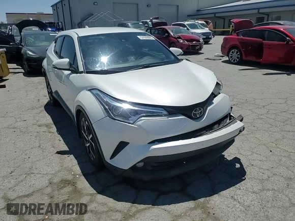 2018 Toyota C-HR XLE with VIN NMTKHMBX5JR042017, listed as a Copart auction lot 57630085 with 36,614 mi miles and Salvage title. Bid and sale history available at DreamBid. Image 14.