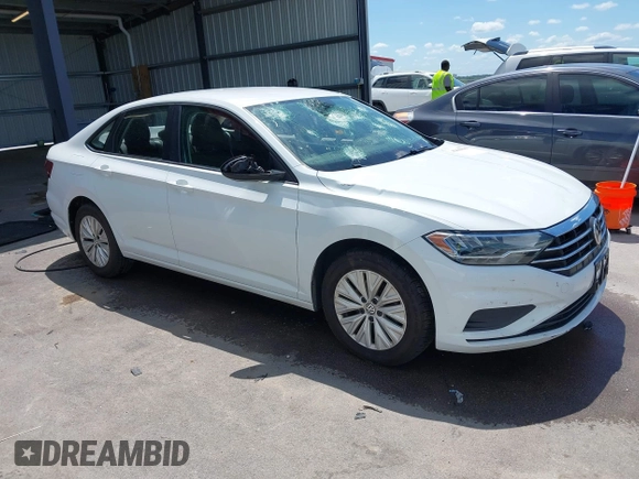 2019 Volkswagen Jetta S z VIN 3VWC57BU7KM200586, wystawiony jako IAAI lot #42609606 z przebiegiem 72 874 mil mil oraz . Historia ofert i sprzedaży dostępna na DreamBid. Obrazek 1.