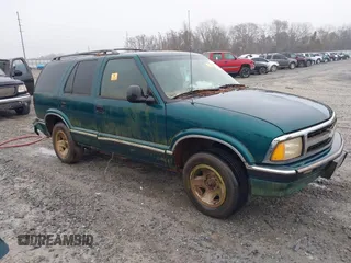 1997 Chevrolet Blazer LS with VIN 1GNCS13W1V2261394, listed as a IAAI auction lot 41543411 with 216,965 mi miles and . Bid and sale history available at DreamBid. Image 1.