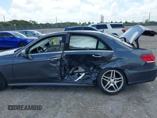 2014 Mercedes-Benz E 350 Sport with VIN WDDHF5KB1EB003911, listed as a IAAI auction lot 41931506 with 59,996 mi miles and . Bid and sale history available at DreamBid. Image 6.