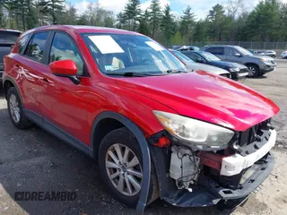 2014 Mazda CX-5 Touring z VIN JM3KE4CY1E0366745, wystawiony jako IAAI lot #42160099 z przebiegiem 219 396 mil mil oraz . Historia ofert i sprzedaży dostępna na DreamBid. Obrazek 1.