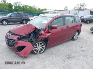 2012 Mazda 5 Grand Touring with VIN JM1CW2DL8C0142483, listed as a IAAI auction lot 42258349 with 144,547 mi miles and . Bid and sale history available at DreamBid. Image 2.