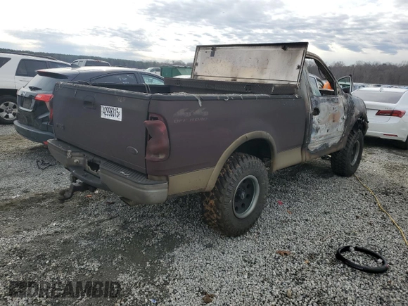 1999 Ford F-150 z VIN 1FTRF18W2XNA60279, wystawiony jako Copart lot #42998315 z przebiegiem Nie podano mil oraz Szkoda całkowita • Salvage title. Historia ofert i sprzedaży dostępna na DreamBid. Obrazek 3.