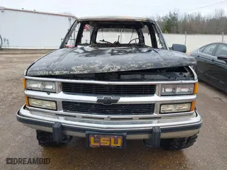 1998 Chevrolet Tahoe with VIN 3GNEK18R0WG121275, listed as a IAAI auction lot 41721304 with 1 mi miles. Bid and sale history available at carsss.com. Image 6.