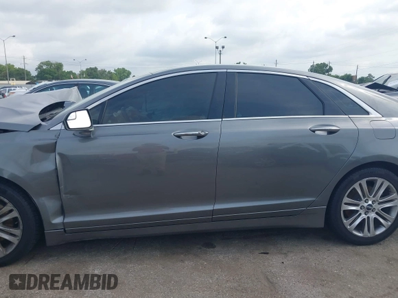 2014 Lincoln MKZ z VIN 3LN6L2GK3ER807586, wystawiony jako IAAI lot #42426125 z przebiegiem 198 281 mil mil oraz . Historia ofert i sprzedaży dostępna na DreamBid. Obrazek 13.