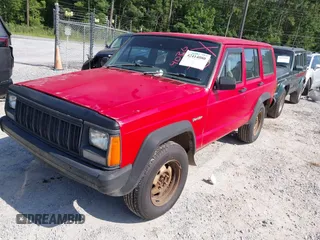 1996 Jeep Cherokee z VIN 1J4FB28S4TL145447, wystawiony jako IAAI lot #42414080 z przebiegiem 437 448 mil mil oraz . Historia ofert i sprzedaży dostępna na DreamBid. Obrazek 2.