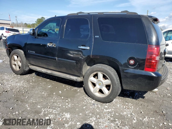 2007 Chevrolet Tahoe LT z VIN 1GNFC13077R288857, wystawiony jako Copart lot #48496775 z przebiegiem 285 932 mil mil oraz Szkoda całkowita • Salvage title. Historia ofert i sprzedaży dostępna na DreamBid. Obrazek 2.