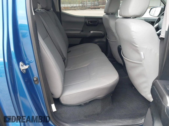 2018 Toyota Tacoma SR5 with VIN 3TMAZ5CNXJM069212, listed as a IAAI auction lot 42010564 with 73,825 mi miles and . Bid and sale history available at DreamBid. Image 8.