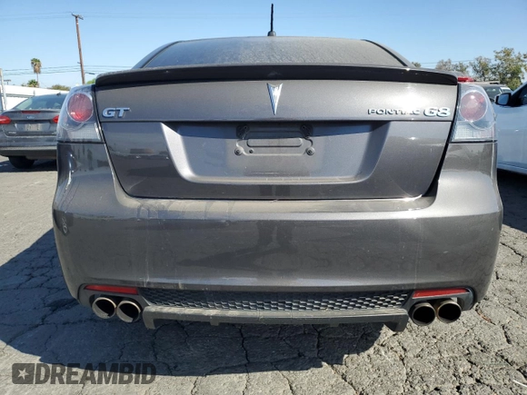 2009 Pontiac G8 GT with VIN 6G2EC57Y19L215718, listed as a Copart auction lot 77231714 with 57,515 mi miles and Salvage Title. Bid and sale history available at carsss.com. Image 6.