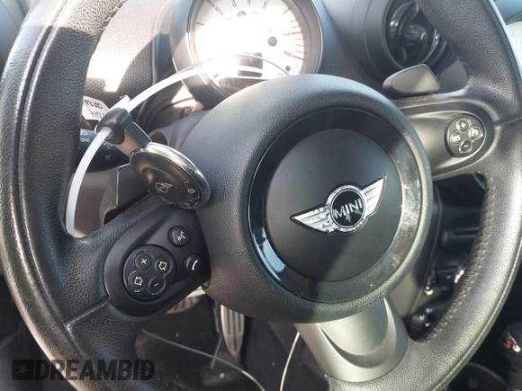 2013 MINI Countryman S ALL4 with VIN WMWZC5C58DWP33707, listed as a IAAI auction lot 41835234 with 98,441 mi miles and . Bid and sale history available at DreamBid. Image 11.