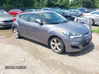 2014 Hyundai Veloster RE:FLEX with VIN KMHTC6AD7EU184390, listed as a IAAI auction lot 42652331 with 107,854 mi miles and . Bid and sale history available at DreamBid. Image 1.