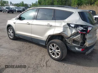 2018 Ford Escape SE z VIN 1FMCU9GD1JUB02119, wystawiony jako IAAI lot #42092393 z przebiegiem 69 309 mil mil oraz . Historia ofert i sprzedaży dostępna na DreamBid. Obrazek 3.