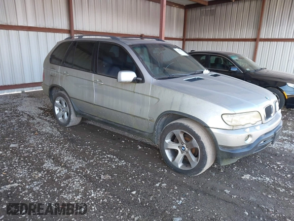 2001 BMW X5 3.0i with VIN WBAFA53591LH79412, listed as a IAAI auction lot 41410946 with 186,315 mi miles. Bid and sale history available at carsss.com. Image 1.