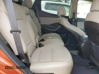 2016 Hyundai Santa Fe z VIN 5XYZTDLB7GG346554, wystawiony jako Copart lot #56898045 z przebiegiem 84 915 mil mil oraz Szkoda całkowita • Salvage title. Historia ofert i sprzedaży dostępna na DreamBid. Obrazek 11.