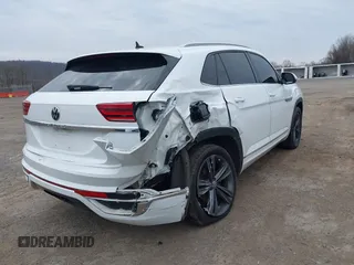 2021 Volkswagen Atlas SE z VIN 1V2RE2CA2MC205086, wystawiony jako IAAI lot #41902654 z przebiegiem 111 024 mil mil oraz . Historia ofert i sprzedaży dostępna na DreamBid. Obrazek 6.